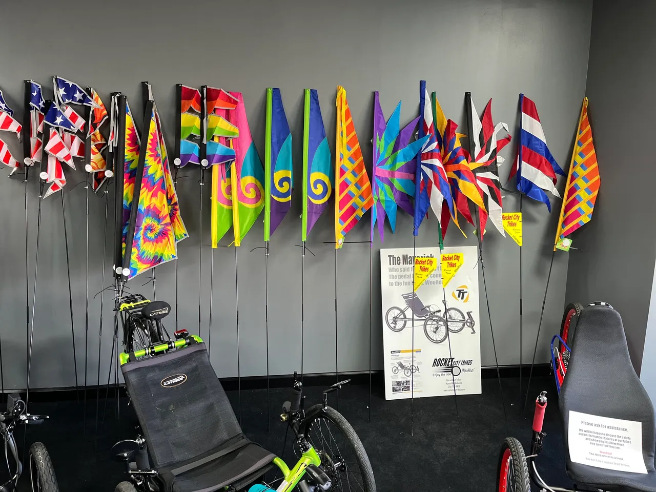Safety flags and trike accessories on display in the showroom